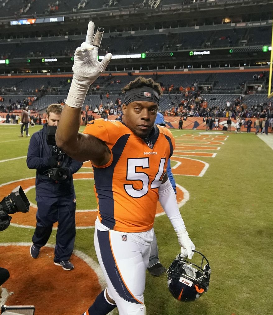FILE - In this Dec. 30, 2018, file photo, Denver Broncos inside linebacker Brandon Marshall gestures after an NFL game against the Los Angeles Chargers, in Denver. Even though Brandon Marshall was expecting it, Friday's, Feb. 15, 2019, news that he'd probably played his last game in Denver threw him for a bit of a loop. "It's just different when it's in the news and everybody knows about it and it's not just you and your agent talking about it," Marshall said after the Broncos told his agent, Drew Rosenhause, they didn't plan to pick up Marshall's option. (AP Photo/Jack Dempsey, File)