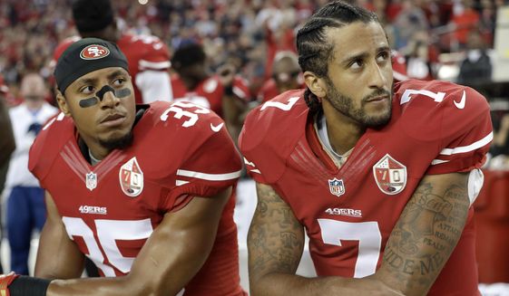 FILE - In this Sept. 12, 2016, file photo, San Francisco 49ers safety Eric Reid (35) and quarterback Colin Kaepernick (7) kneel during the national anthem before an NFL football game against the Los Angeles Rams, in Santa Clara, Calif. Colin Kaepernick and Eric Reid have reached settlements on their collusion lawsuits against the NFL, the league said Friday, Feb. 19, 2019.(AP Photo/Marcio Jose Sanchez) ** FILE **