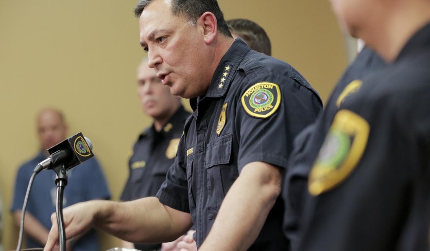 Houston Police Chief Art Acevedo talks to the media during a press conference at the police station, Friday, Feb. 15, 2019 in Houston. A lead investigator lied in an affidavit justifying a drug raid on a Houston home in which two residents were killed and four undercover officers were shot and wounded during a gun battle, the city’s police chief said Friday. ( Elizabeth Conley/Houston Chronicle via AP)