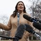 White House press secretary Sarah Sanders talks with reporters outside the White House in Washington, Friday, Feb. 15, 2019. (AP Photo/Carolyn Kaster) **FILE**