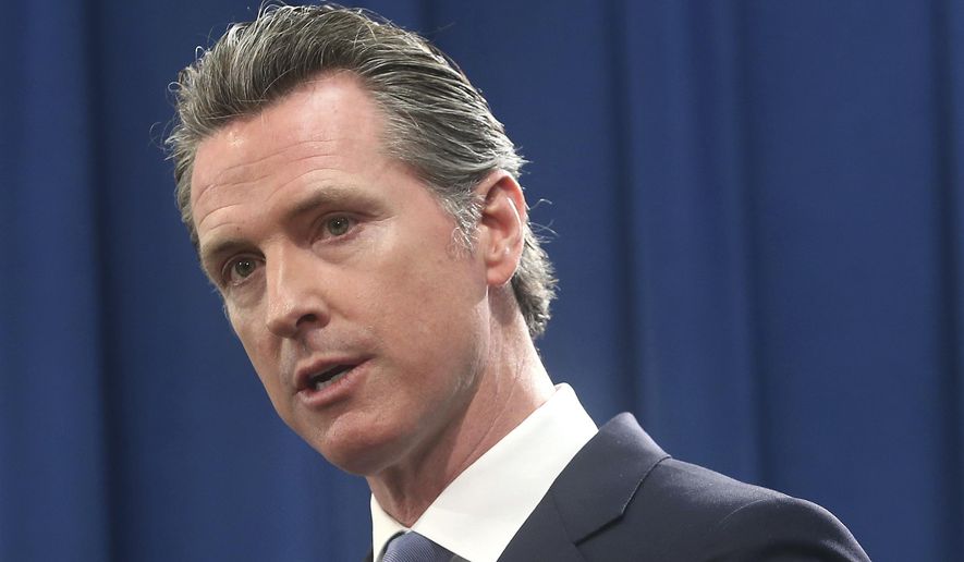 California Gov. Gavin Newsom discusses the lawsuit the state will likely file against President Donald Trump over his emergency declaration to fund a wall on the U.S.-Mexico border Friday, Feb. 15, 2019, in Sacramento, Calif. Newsom says there is no emergency at the border and Trump doesn't have the authority to make the declaration. (AP Photo/Rich Pedroncelli)