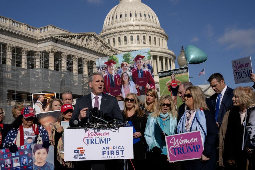 In this Feb. 13, 2018, photo, House Minority Leader Kevin McCarthy, R-Calif., joins supporters of President Donald Trump and family members of Americans killed by undocumented immigrants as they gather to to promote their support for a border wall with Mexico, at the Capitol in Washington. When you want results in a polarized Washington, sometimes it pays to simply leave the professionals alone to do their jobs. (AP Photo/J. Scott Applewhite)