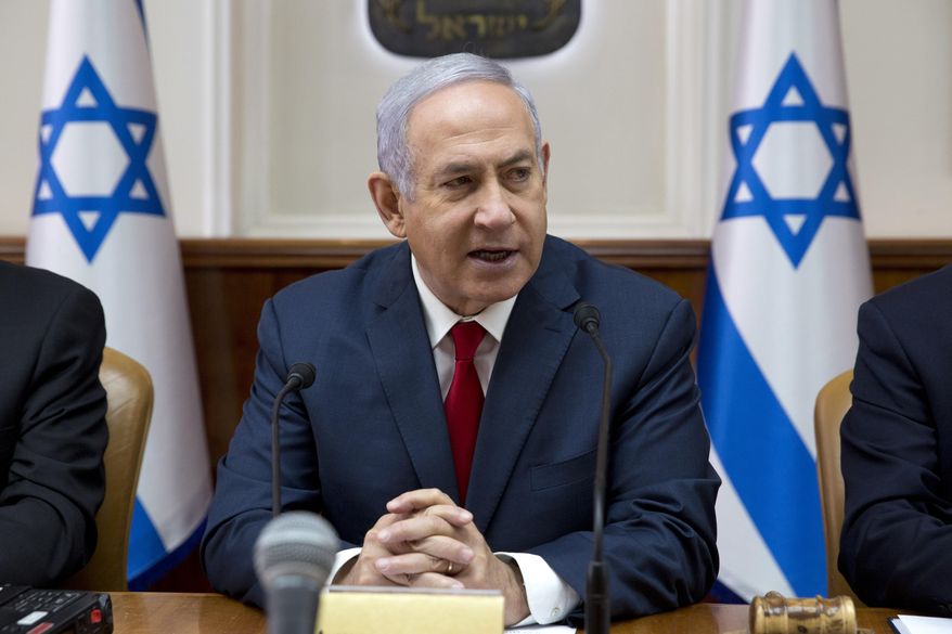 Israeli Prime Minister Benjamin Netanyahu chairs the weekly cabinet meeting at the Prime Minister's office in Jerusalem, Sunday, Feb. 17, 2019. (AP Photo/Sebastian Scheiner, Pool)