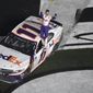 Denny Hamlin (11) celebrates after winning the NASCAR Daytona 500 auto race at Daytona International Speedway Sunday, Feb. 17, 2019, in Daytona Beach, Fla. (AP Photo/Phelan M. Ebenhack)