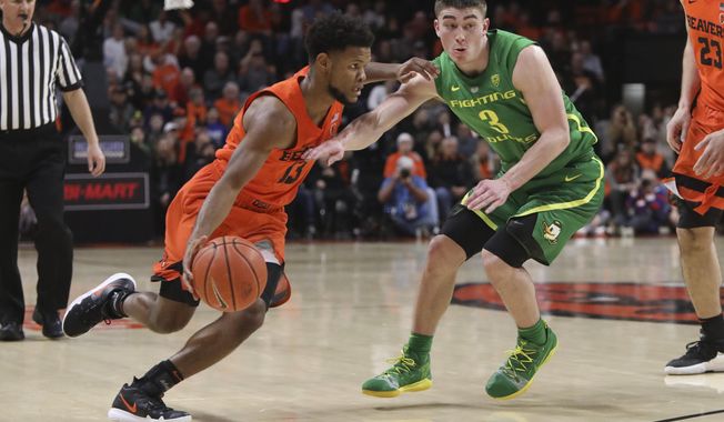 Oregon State&#x27;s Antoine Vernon (13) tries to get by Oregon&#x27;s Payton Pritchard (3) during the first half of an NCAA college basketball game in Corvallis, Ore., Saturday, Feb. 16, 2019. (AP Photo/Amanda Loman)