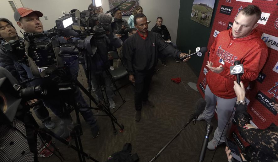 Los Angeles Angels' Mike Trout talks to the media during a news conference at their spring baseball training facility in Tempe, Ariz., Monday, Feb. 18, 2019. (AP Photo/Chris Carlson)
