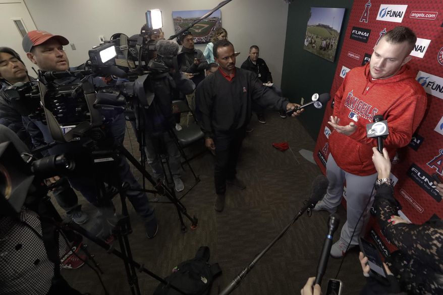Los Angeles Angels' Mike Trout talks to the media during a news conference at their spring baseball training facility in Tempe, Ariz., Monday, Feb. 18, 2019. (AP Photo/Chris Carlson)