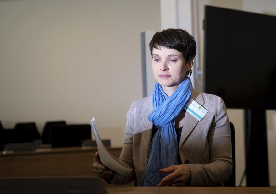 Former chairwomen of the German Alternative for Germany, AfD, party Frauke Petry arrives at the regional court in Dresden, Germany, Monday, Feb. 18, 2019. Petry appeared Monday before the court to defend herself against accusations she made false statements to parliament while under oath. (Monika Skolimowska/dpa-Zentralbild Pool/dpa via AP, pool)
