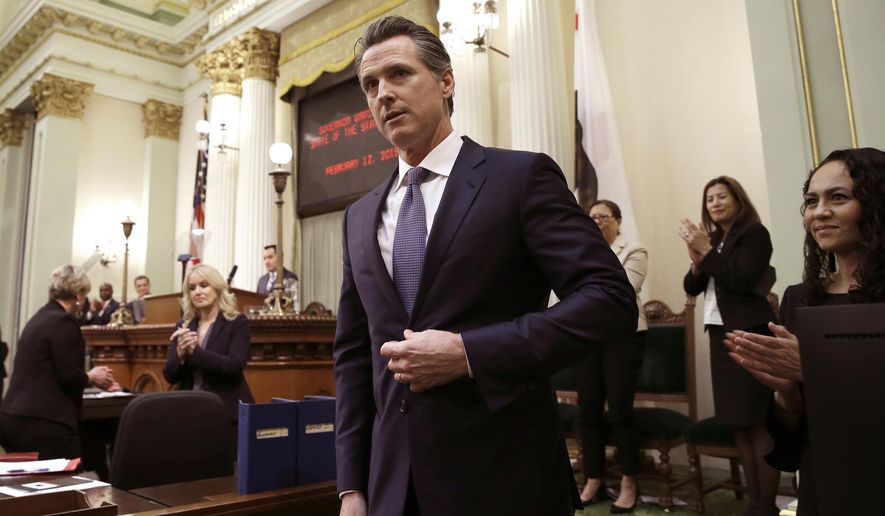 FILE - In this Feb. 12, 2019, file photo, Calif., Gov. Gavin Newsom receives applause after delivering his first State of the State address to a joint session of the legislature at the Capitol in Sacramento, Calif. Newsom declared in his first State of the State address last week that he planned to scale back California&#x27;s high-speed rail project and focus immediately on building 171 miles of track in central California. The Trump administration said Tuesday, Feb. 19, that it plans to cancel $929 million awarded to California&#x27;s high-speed rail project and wants the state to return an additional $2.5 billion that it has already spent. (AP Photo/Rich Pedroncelli, File)