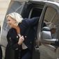 Far-right leader Marine Le Pen steps out of her car to meet French President Emmanuel Macron at the Elysee Palace in Paris, France, Wednesday, Feb. 6, 2019. Marine Le Pen meets President Emmanuel Macron to exchange political issues. (AP Photo/Michel Euler)