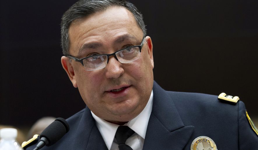 FILE - In this Feb. 6, 2019 file photo, Houston Police Department chief Art Acevedo testifies before the House Judiciary Committee hearing on gun violence, at Capitol Hill in Washington. The police chief announced on Monday, Feb. 18 that the Houston Police Department will end its use no-knock warrants, just weeks after a drug raid on a home in which two suspects were fatally shot and five undercover officers were injured. Acevedo said officers will need to receive a special exemption from his office to conduct a no-knock raid. (AP Photo/Jose Luis Magana, File)