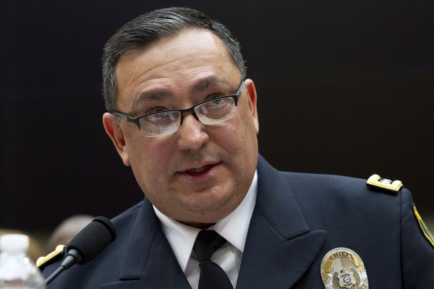 FILE - In this Feb. 6, 2019 file photo, Houston Police Department chief Art Acevedo testifies before the House Judiciary Committee hearing on gun violence, at Capitol Hill in Washington. The police chief announced on Monday, Feb. 18 that the Houston Police Department will end its use no-knock warrants, just weeks after a drug raid on a home in which two suspects were fatally shot and five undercover officers were injured. Acevedo said officers will need to receive a special exemption from his office to conduct a no-knock raid. (AP Photo/Jose Luis Magana, File)