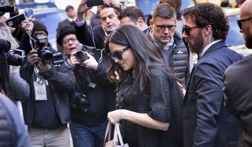 Meghan, Duchess of Sussex, arrives for her baby shower at the Mark Hotel on Tuesday, Feb. 19, 2019, in New York. (AP Photo/Kevin Hagen).