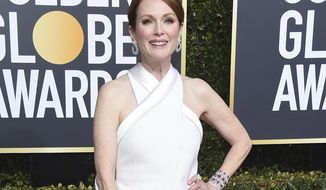 FILE - In this Jan. 6, 2019 file photo, Julianne Moore arrives at the 76th annual Golden Globe Awards in Beverly Hills, Calif. Moore has helped New York Gov. Andrew Cuomo’s administration unveil the governor’s series of initiatives aimed at improving the lives of women in New York. Cuomo’s list of proposals for 2019 includes eliminating the statute of limitations for rape claims and increasing protections against sexual harassment in the workplace. (Photo by Jordan Strauss/Invision/AP, File)