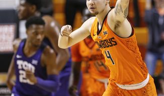 Oklahoma State&#39;s Thomas Dziagwa (4) celebrates after making a three-point shot in the second half of a NCAA college basketball game against TCU in Stillwater, Okla., Monday, Feb. 18, 2019. (Nate Billings/The Oklahoman via AP)