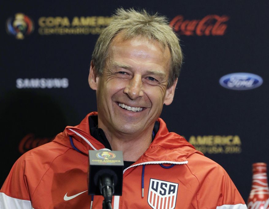 FILE - In this June 20, 2016, file photo, then-U.S. men's soccer coach Jurgen Klinsmann talks to reporters during a Copa America Centenario news conference, in Houston. Jurgen Klinsmann received a $3.35 million settlement of his contract with the U.S. Soccer Federation, according to the USSF's tax filing. His replacement, Bruce Arena, was given a $300,000 settlement during the fiscal year that ended March 31, 2018, according to the filing, which was released Monday, Feb. 18, 2019. (AP Photo/Eric Gay, File)