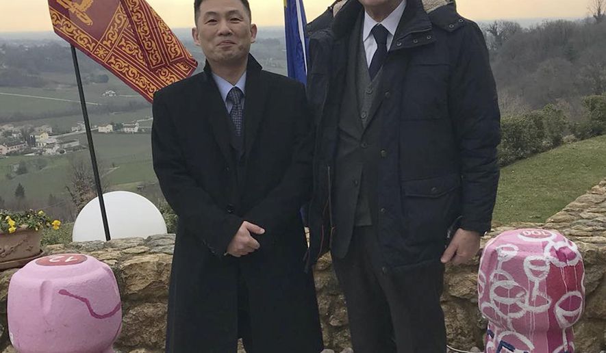 This March 20, 2018 photo provided on Jan. 3, 2019 by Italian senator Valentino Perin, shows the senator, right, posing for a photo with then North Korean diplomat Jo Song Gil on the occasion of a cultural event with the Veneto region at a restaurant in San Pietro di Felletto, near Treviso, northern Italy. Italy&#x27;s foreign minister said Wednesday, Feb. 20, 2019 that Italy is investigating whether the 17-year-old daughter of former North Korean diplomat Jo Song Gil was forcibly returned to Pyongyang as her parents apparently tried to defect. (Valentino Perin via AP)