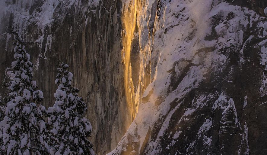 This Sunday, Feb. 17, 2019, photo released by Dakota Snider shows Horsetail Fall in Yosemite National Park, Calif. California&#x27;s Yosemite National Park is again wowing visitors and photographers with its annual &amp;quot;firefall.&amp;quot; Every February for a few days, the setting sun illuminates the Horsetail Fall to make it glow like a cascade of molten lava. (Dakota Snider/dsniderphoto.com via AP)