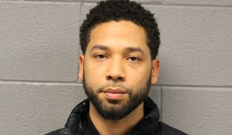This Feb. 21, 2019, booking photo released by Chicago Police Department shows Jussie Smollett. Police say the &quot;Empire&quot; actor has turned himself in to face a charge of making a false police report when he said he was attacked in downtown Chicago by two men who hurled racist and anti-gay slurs and looped a rope around his neck. Police spokesman Anthony Guglielmi says Smollett turned himself in early Thursday, Feb. 21 and was arrested. The charge could bring up to three years in prison for the actor, who&#39;s black and gay. (Chicago Police Department via AP)