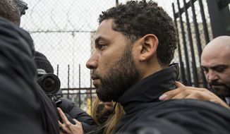 &quot;Empire&quot; actor Jussie Smollett leaves Cook County jail following his release, Thursday, Feb. 21, 2019, in Chicago. Smollett was charged with disorderly conduct and filling a false police report when he said he was attacked in downtown Chicago by two men who hurled racist and anti-gay slurs and looped a rope around his neck, a police official said. (Ashlee Rezin/Chicago Sun-Times via AP)