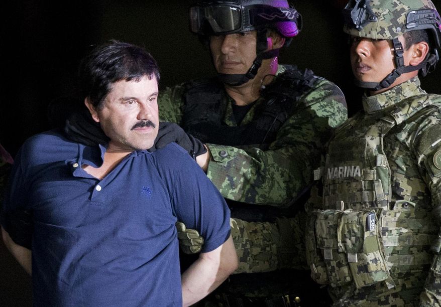 FILE - In this Jan. 8, 2016 file photo, a handcuffed Joaquin "El Chapo" Guzman is made to face the press as he is escorted to a helicopter by Mexican soldiers and marines at a federal hangar in Mexico City. Guzman was tried in New York and found guilty on drug smuggling charges. Claims of jury misconduct arose after a juror told VICE News in February 2019 report that several jurors followed media accounts of the three month-long trial. (AP Photo/Eduardo Verdugo, File)
