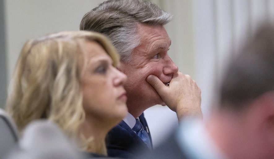 Mark Harris, Republican candidate in North Carolina&#39;s 9th Congressional race, listens to testimony during the third day of a public evidentiary hearing on the 9th Congressional District voting irregularities investigation Wednesday, Feb. 20, 2019, at the North Carolina State Bar in Raleigh, N.C.  (Travis Long/The News &amp;amp; Observer via AP, Pool)