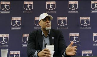 FILE - In this Feb. 19, 2017, file photo, Executive Director of the Major League Players Association, Tony Clark, answers questions at a news conference in Phoenix. Players&#39; union head Tony Clark is guarding against drawing any conclusions about the free-agent market based on Manny Machado’s contract and says Adam Wainwright’s recent comments about a possible strike were in line with the level of concern he hears from the pitcher’s colleagues. Clark met with the Los Angeles Angels on Thursday, Feb. 21, 2019, starting his spring training tour as several top players still look for teams. (AP Photo/Morry Gash, File) **FILE**