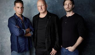 FILE - In this Jan. 24, 2019, file photo, Wade Robson, from left, director Dan Reed and James Safechuck pose for a portrait to promote the film &amp;quot;Leaving Neverland&amp;quot; at the Salesforce Music Lodge during the Sundance Film Festival in Park City, Utah. Michael Jackson accusers Robson and Safechuck say that the Sundance Film Festival is first time they&#x27;ve ever felt public support for their allegations the King of Pop molested them. The documentary which premiered at the festival last month and will air on HBO in two parts on March 3 and 4, chronicles how their lives intersected with Jackson&#x27;s. (Photo by Taylor Jewell/Invision/AP, File)
