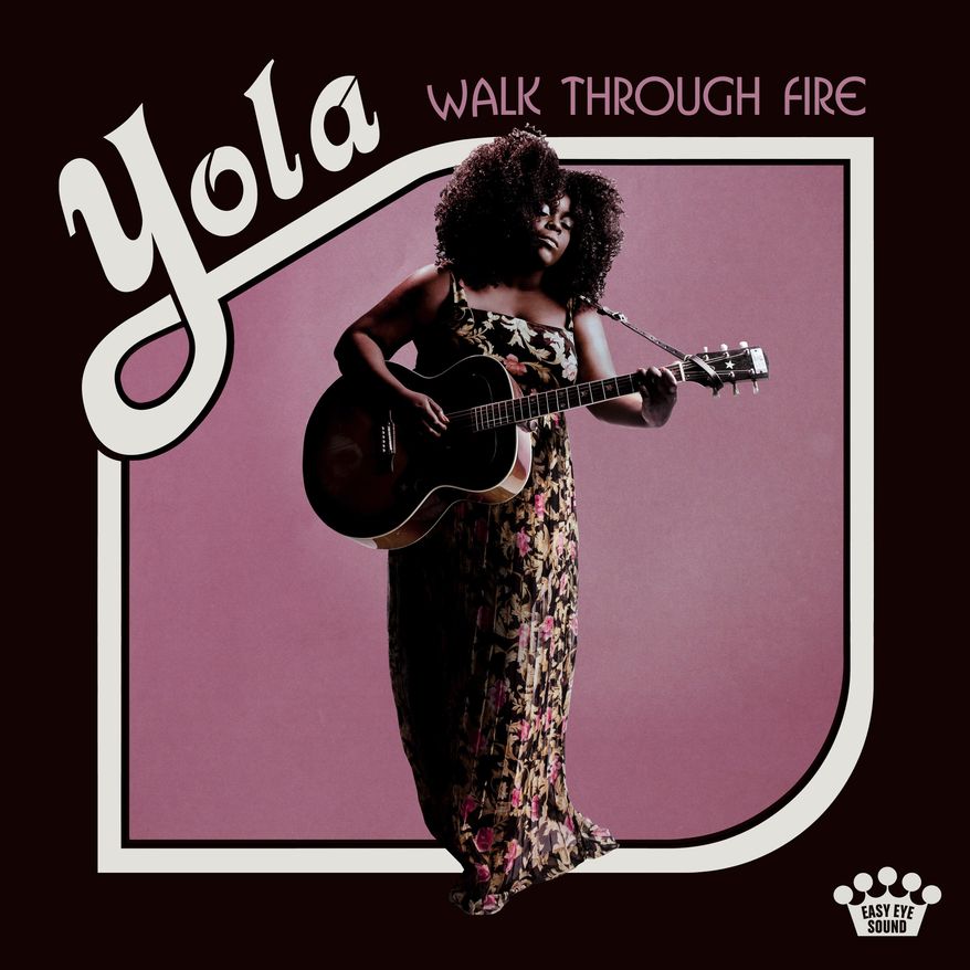 This album cover released by Easy Eye Sound shows "Walk Through Fire," a release by Yola. (Easy Eye Sound via AP)