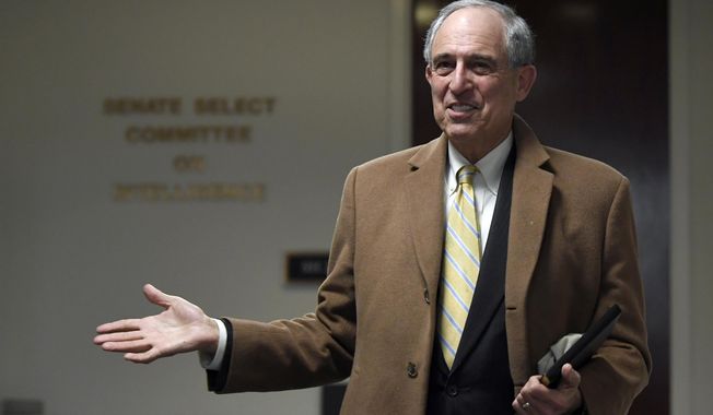 Michael Cohen&#x27;s attorney, Lanny Davis, talks with reporters on Capitol Hill in Washington, Thursday, Feb. 21, 2019. (AP Photo/Susan Walsh)