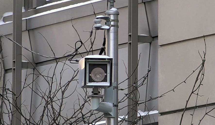 In this Feb. 1, 2019 photo, a surveillance camera is seen near the spot where "Empire" actor Jussie Smollett allegedly staged the attack in Chicago. Chicago police tapped into a vast network of surveillance cameras _ and some homeowners' doorbell cameras _ to help determine the identities of two brothers who later claimed they were paid by "Empire" actor Jussie Smollett to stage a racist and homophobic attack. (AP Photo/Teresa Crawford)