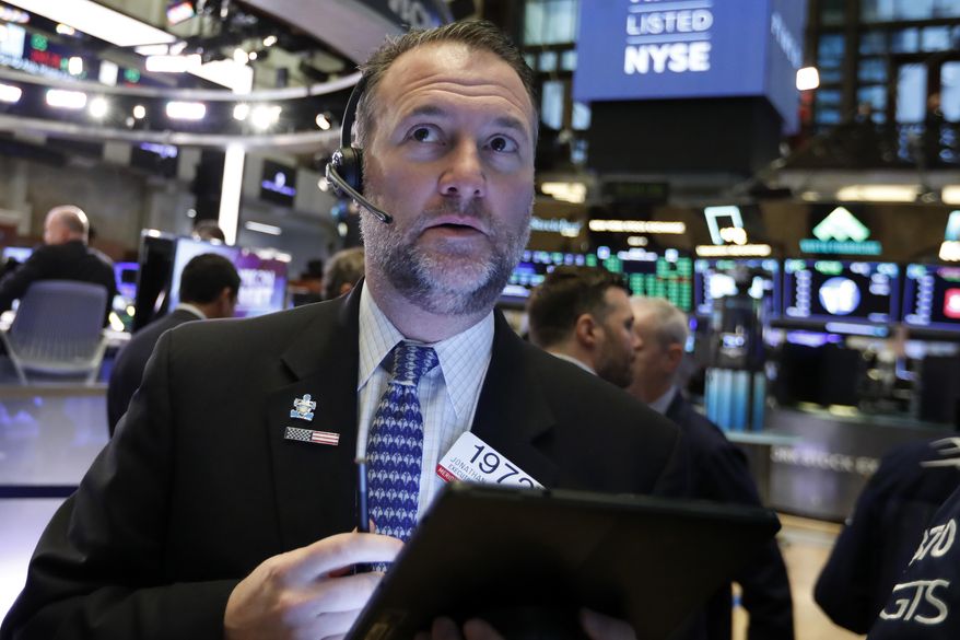 FILE- In this Feb. 15, 2019, file photo trader Jonathan Corpina works on the floor of the New York Stock Exchange. The U.S. stock market opens at 9:30 a.m. EST on Friday, Feb. 22. (AP Photo/Richard Drew, File)