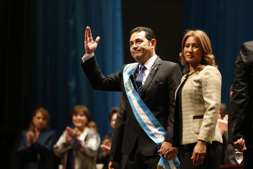FILE - In this Jan. 14, 2016 file photo, first lady Hilda Patricia Marroquin de Morales accompanies her husband Guatemalan President Jimmy Morales, at the National Theater in Guatemala City. Guatemala’s chief prosecutor announced on Friday, Feb. 22, 2019 that her office has initiated an investigation of alleged corruption against the first lady. (AP Photo/Moises Castillo, File)