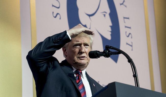 FILE - In this May 22, 2018 file photo, President Donald Trump looks out at the audience during a speech at the Susan B. Anthony List 11th Annual Campaign for Life Gala at the National Building Museum in Washington. The Trump administration said Friday that it would bar taxpayer-funded family planning clinics from referring women for abortions, a move certain to be challenged in court by abortion rights supporters.  (AP Photo/Andrew Harnik)