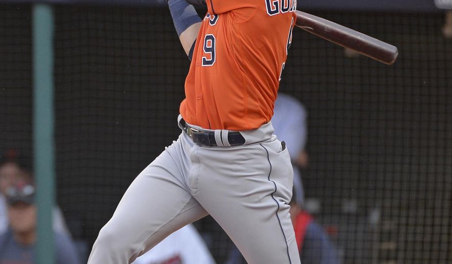 FILE - In this Oct. 8, 2018, file photo, Houston Astros' Marwin Gonzalez hits a two-run double in the seventh inning during Game 3 of a baseball American League Division Series against the Cleveland Indians, in Cleveland. A person familiar with the negotiations tells The Associated Press that versatile Marwin Gonzalez and the Minnesota Twins have agreed to a $21 million, two-year contract. The person spoke on condition of anonymity Friday, Feb. 22, 2019, because the agreement is subject to a successful physical. (AP Photo/Phil Long, File)