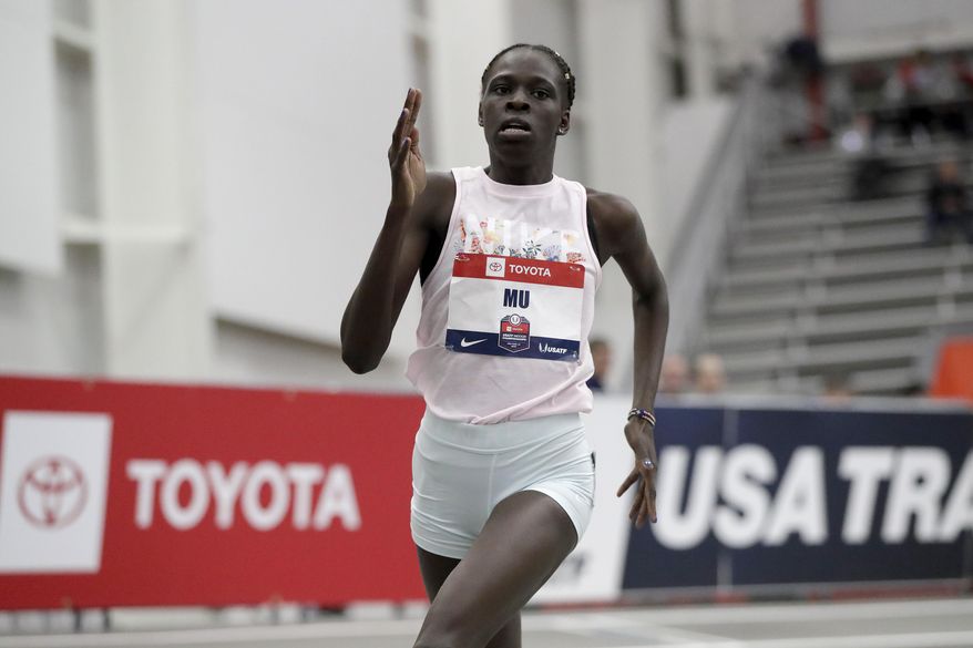 Athing Mu runs in a 600-meter heat at the USA Track & Field Indoor Championships, Saturday, Feb. 23, 2019, in New York. (AP Photo/Julio Cortez)