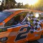Brad Keselowski drives into Victory Lane after winning a Monster Energy NASCAR Cup Series auto race at Atlanta Motor Speedway, Sunday, Feb. 24, 2019, in Hampton, Ga. (AP Photo/John Amis)