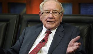 FILE- In this May 7, 2018, file photo Berkshire Hathaway Chairman and CEO Warren Buffett speaks during an interview in Omaha, Neb., with Liz Claman on Fox Business Network&#x27;s &amp;quot;Countdown to the Closing Bell.&amp;quot; Buffett said Greg Abel and Ajit Jain, the two potential successors he named,  earned roughly $18 million last year managing Berkshire Hathaway’s dozens of operating companies. Buffett appeared on CNBC Monday, Feb. 25, 2019, after releasing his annual letter to Berkshire shareholders over the weekend. He reiterated Monday that Abel and Jain have both done a great job since they joined Berkshire’s board last January. (AP Photo/Nati Harnik, File)
