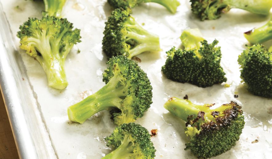 This undated photo provided by America's Test Kitchen in February 2019 shows Roasted Broccoli in Brookline, Mass. This recipe appears in “The Complete Cookbook for Young Chefs.” (Daniel J. van Ackere/America's Test Kitchen via AP)