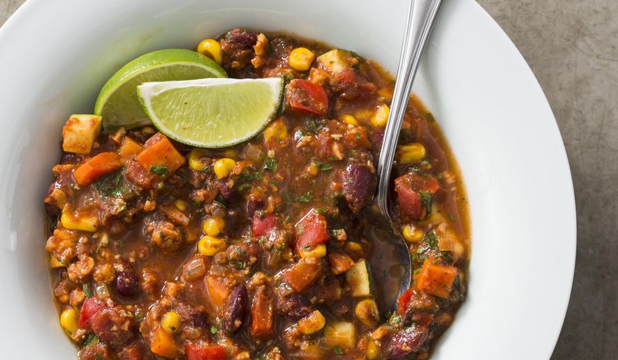 This undated photo provided by America's Test Kitchen in February 2019 shows Vegetarian Chili in Brookline, Mass. This recipe appears in "The Complete Diabetes Cookbook." (Joe Keller/America's Test Kitchen via AP)