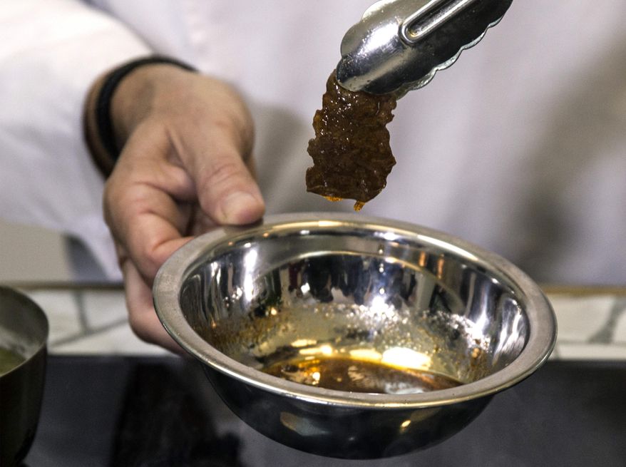 This Wednesday, Jan. 16, 2019 photo, shows a a first lab-grown steak during a presentation by the Israeli company Aleph Farms, in Jaffa, Israel. Several Israeli start-ups have joined a handful of companies around the globe trying to develop lab-grown meat, something they see as a solution to the needs of the world’s ever-growing population and burgeoning demand for food. (AP Photo/Tsafrir Abayov)