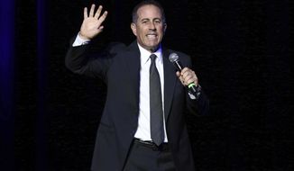 FILE - In this Nov. 1, 2016 file photo, Jerry Seinfeld performs at Stand Up For Heroes, at The Theater in New York&#x27;s Madison Square Garden. Seinfeld is suing a California dealer in classic cars, saying the company has left him stranded in a dispute over whether a 1958 Porsche he sold is authentic. The suit comes weeks after Seinfeld was sued by a company that says it bought the comedian&#x27;s Porsche for $1.5 million only to learn it was fake. (Photo by Greg Allen/Invision/AP, File)