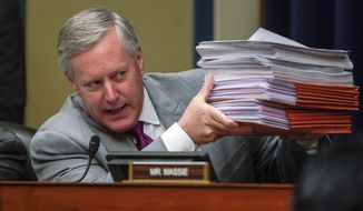 Rep. Mark Meadows, R-N.C., objects to House Oversight and Reform Committee Chair Elijah Cummings, D-Md., efforts to subpoena Trump administration officials over family separations at the southern border, on Capitol Hill in Washington, Tuesday, Feb. 26, 2019. The committee voted to subpoena Trump administration officials over family separations at the southern border, the first issued in the new Congress as Democrats have promised to hold the administration aggressively to count.  The decision by the Oversight Committee will compel the heads of Justice, Homeland Security and Health and Human Services to deliver documents.  (AP Photo/J. Scott Applewhite)