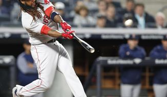 FILE - In this May 9, 2018, file photo, Boston Red Sox&#x27;s Hanley Ramirez hits a seventh-inning, two-run home run off New York Yankees relief pitcher Chad Green in a baseball game in New York. Free agent slugger Hanley Ramirez has signed with the Indians, who hope he can give them some power. The 35-year-old Ramirez passed his physical and reported to training camp on Tuesday, Feb. 26, 2019. (AP Photo/Kathy Willens, File)