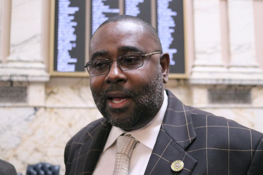 Del. Darryl Barnes, chairman of the Legislative Black Caucus of Maryland, talks to reporters on Tuesday, Feb. 26, 2019, about a state legislator's use of a racial slur in describing a majority black county the state. The legislator, Del. Mary Ann Lisanti, has apologized and was stripped of a leadership post Tuesday by House Speaker Michael Busch. (AP Photo/Brian Witte)