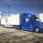 A JNJ Express truck is parked at an abandoned shopping center that the company plans to turn into its new headquarters on Tuesday, Feb. 26, 2019 in Memphis, Tenn. (AP Photo/Adrian Sainz)