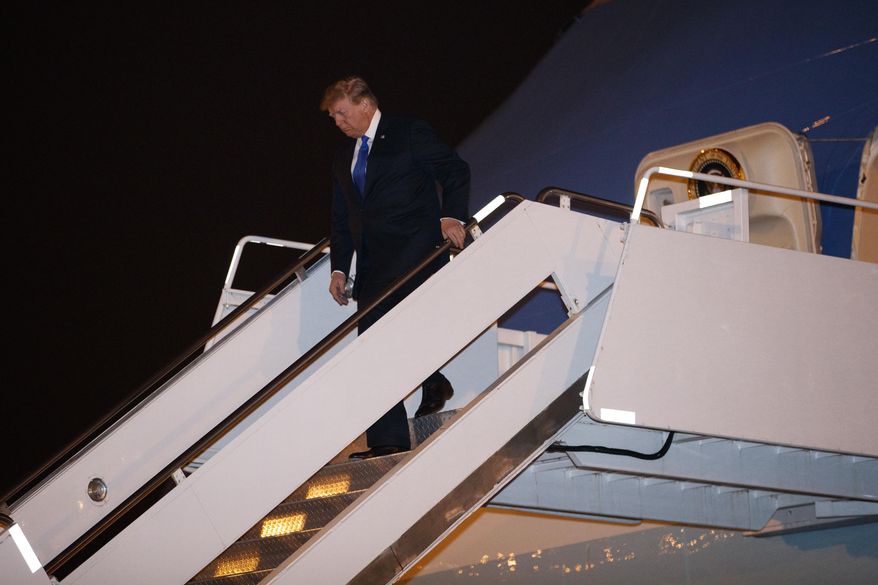 U.S President Donald Trump arrives at Noi Bai Airport before a summit with North Korean leader Kim Jong Un, Tuesday, Feb. 26, 2019, in Hanoi. (AP Photo/ Evan Vucci)