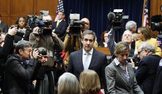 Michael Cohen, President Donald Trump&#39;s former personal lawyer, arrives to testify before the House Oversight and Reform Committee on Capitol Hill, Wednesday, Feb. 27, 2019, in Washington. (AP Photo/Alex Brandon)
