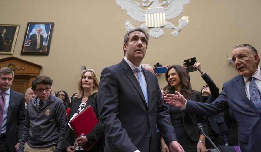 Michael Cohen, President Donald Trump&#39;s former personal lawyer, arrives to testify before the House Oversight and Reform Committee on Capitol Hill in Washington, Wednesday, Feb. 27, 2019.  (AP Photo/J. Scott Applewhite)