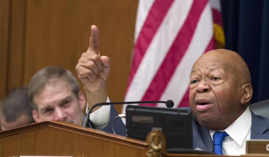 House Oversight and Reform Committee Chair Elijah Cummings, D-Md., right, speaks as he gives closing remarks with Rep. Jim Jordan, R-Ohio, the ranking member, at left, as the hearing for Michael Cohen, President Donald Trump's former lawyer, at the House Oversight and Reform Committee concludes, on Capitol Hill, Wednesday, Feb. 27, 2019, in Washington. (AP Photo/Alex Brandon)
